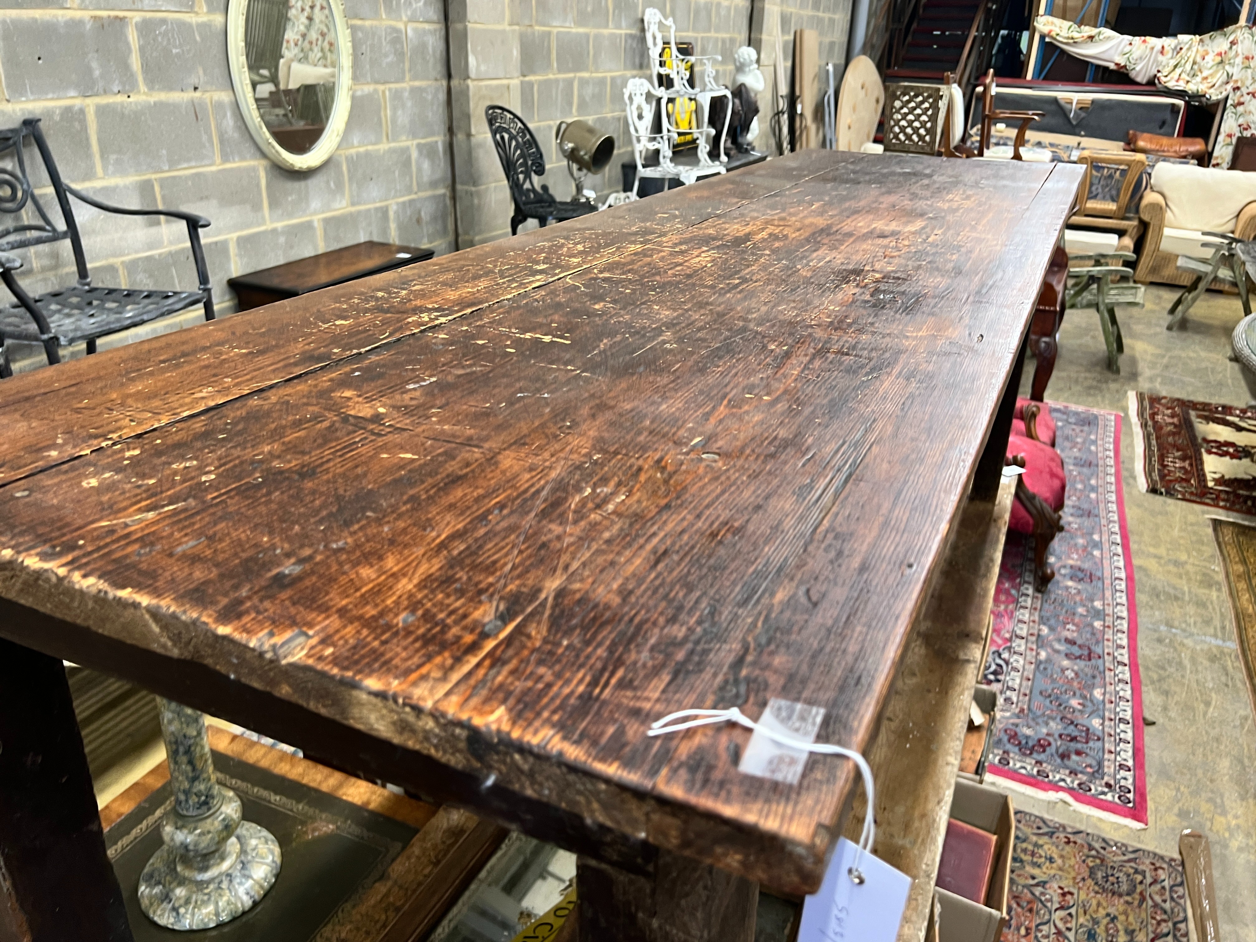 A Victorian stained pine rectangular kitchen table, length 208cm, depth 60cm, height 75cm